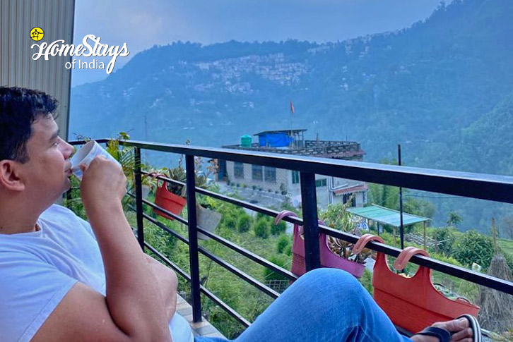 Enjoy-Tea-at-Balcony-Echoes of Sikkim Homestay-Gangtok