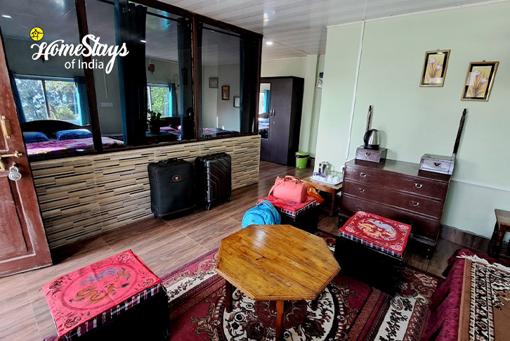 Family-Cottage-Living-Area-Timeless Elegance Heritage Homestay-Takdah