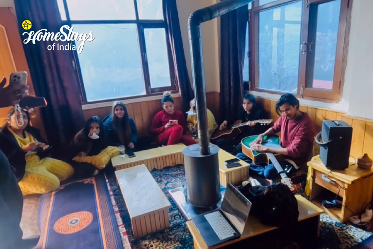 Guest-in-living-area-Panorama Peaks Homestay-Manali