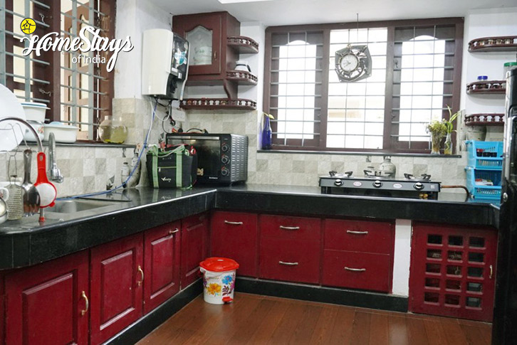 Kitchen-Peaceful Pondside Homestay-Thiruvananthapuram